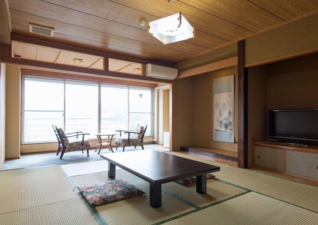 Izuito Onsen Daitokan Номер фото